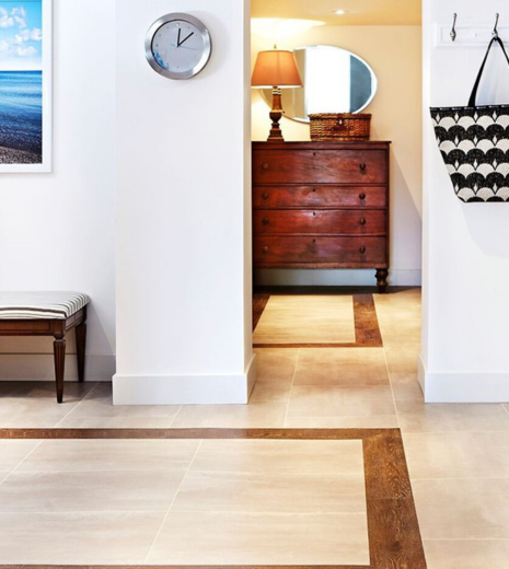 Sundown Oak HC04 planks form borders mimicking carpet around Terra SP212 tiles in an entry