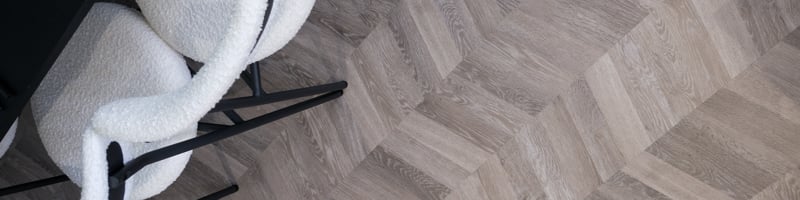 Taylor Wimpey Manchester homes laid with Karndean Grey Washed Oak chevron wood flooring