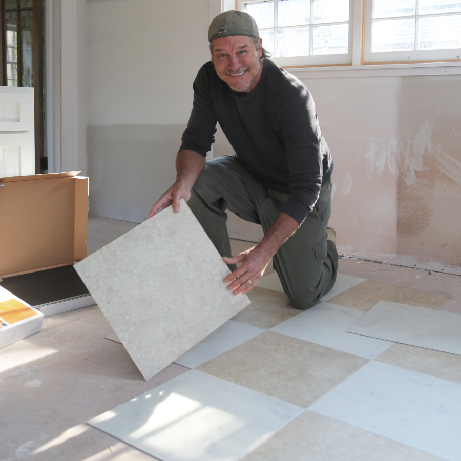 Ty installing Piazza Limestone and Fiore in a diamond pattern