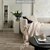 Karndean distressed oak wood flooring in a bedroom