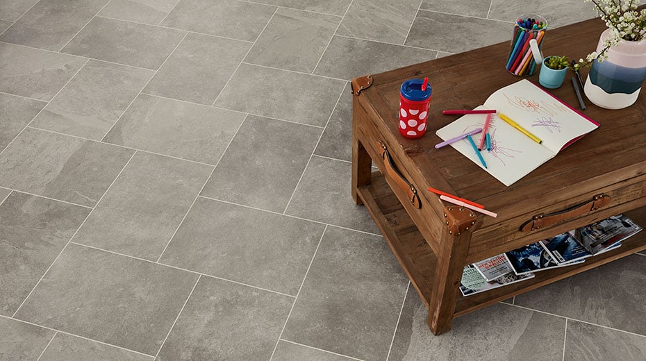 Grey Riven Slate ST16 in a herringbone layout with a coffee table