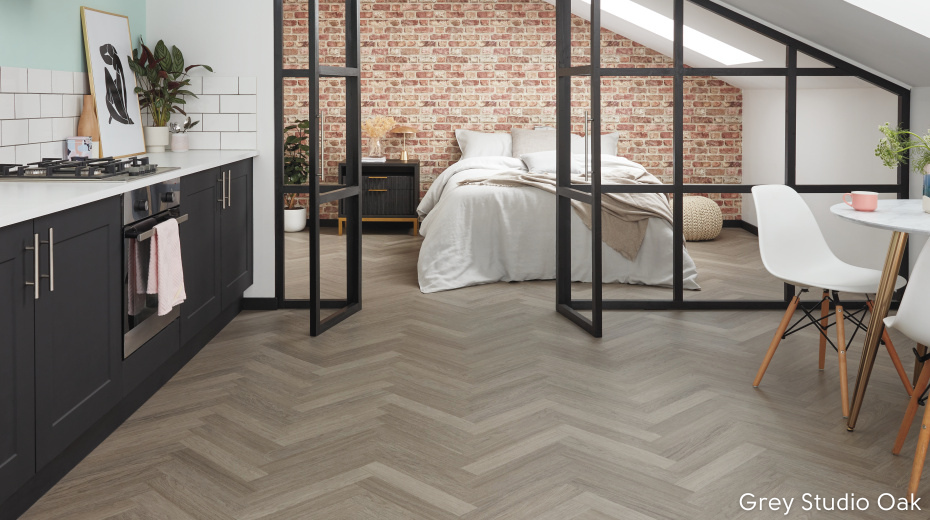 Karndean Designflooring grey studio oak herringbone flooring in a studio flat