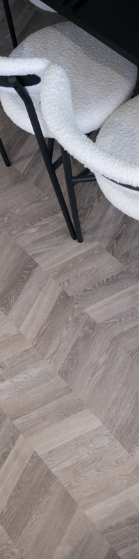 Taylor Wimpey Manchester homes laid with Karndean Grey Washed Oak chevron wood flooring