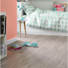 Pink bedroom with light blue accents and French Grey Oak LLP308 floors