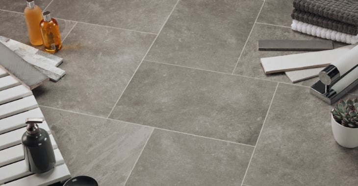 Grey Riven Slate ST16 floors with bath accessories and tile samples